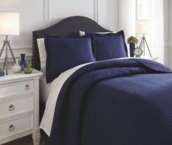 Signature Design By Ashley® Raleda Navy King Coverlet Set -Bedding Store d07d1142 051a 4425 928c a6c80eb5ceba