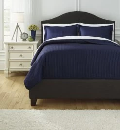 Signature Design By Ashley® Raleda Navy King Coverlet Set -Bedding Store e009b92e ad53 467d bc5b f9b8be32a2e8